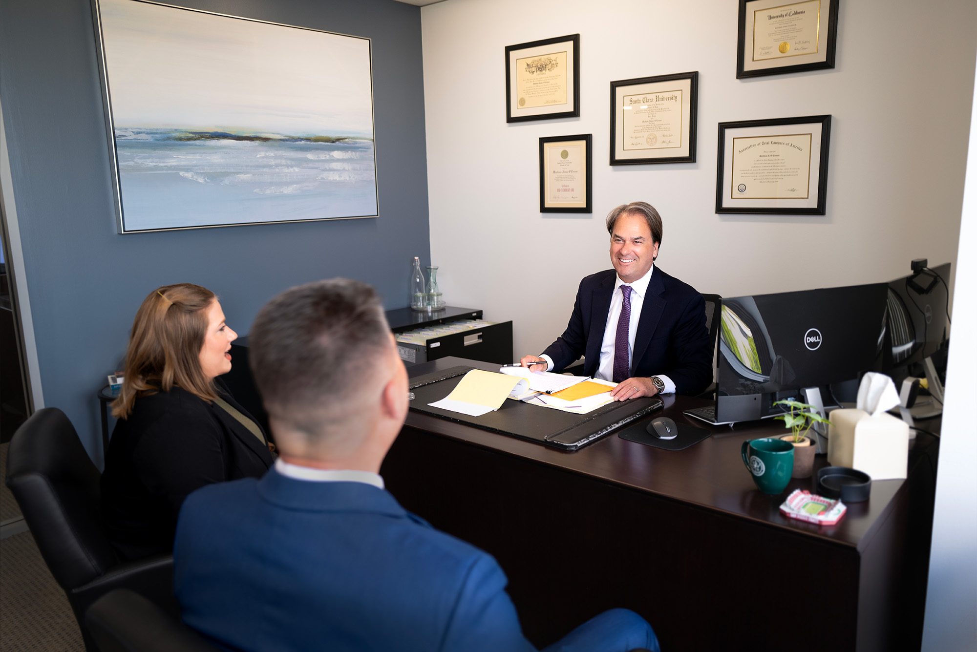 Attorney O'Connor speaking with his team