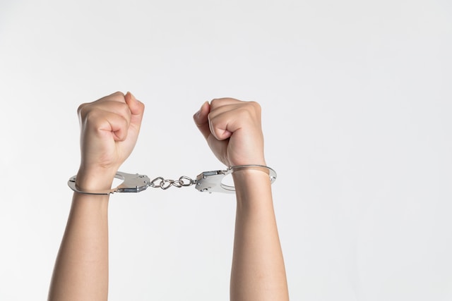 handcuffs against white background